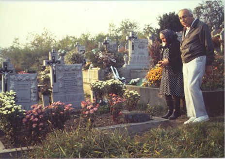 Margitko Demeter shows an American visitor the graves of her son, Gyula Demeter (1941-1980), and her husband, Ignac Demeter, in the cemetery in Faj, Hungary. Courtesy D. Gonthier, taken 1989
